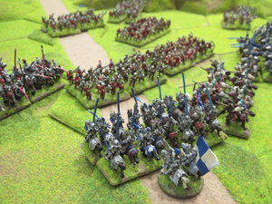 The Lancastrians are forced back in front of the escarpment and back along the road